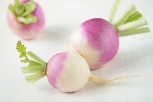 Three turnips with purple skin
